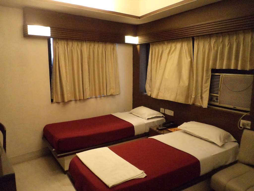 Hotel Aston Kalkuta Pokój zdjęcie